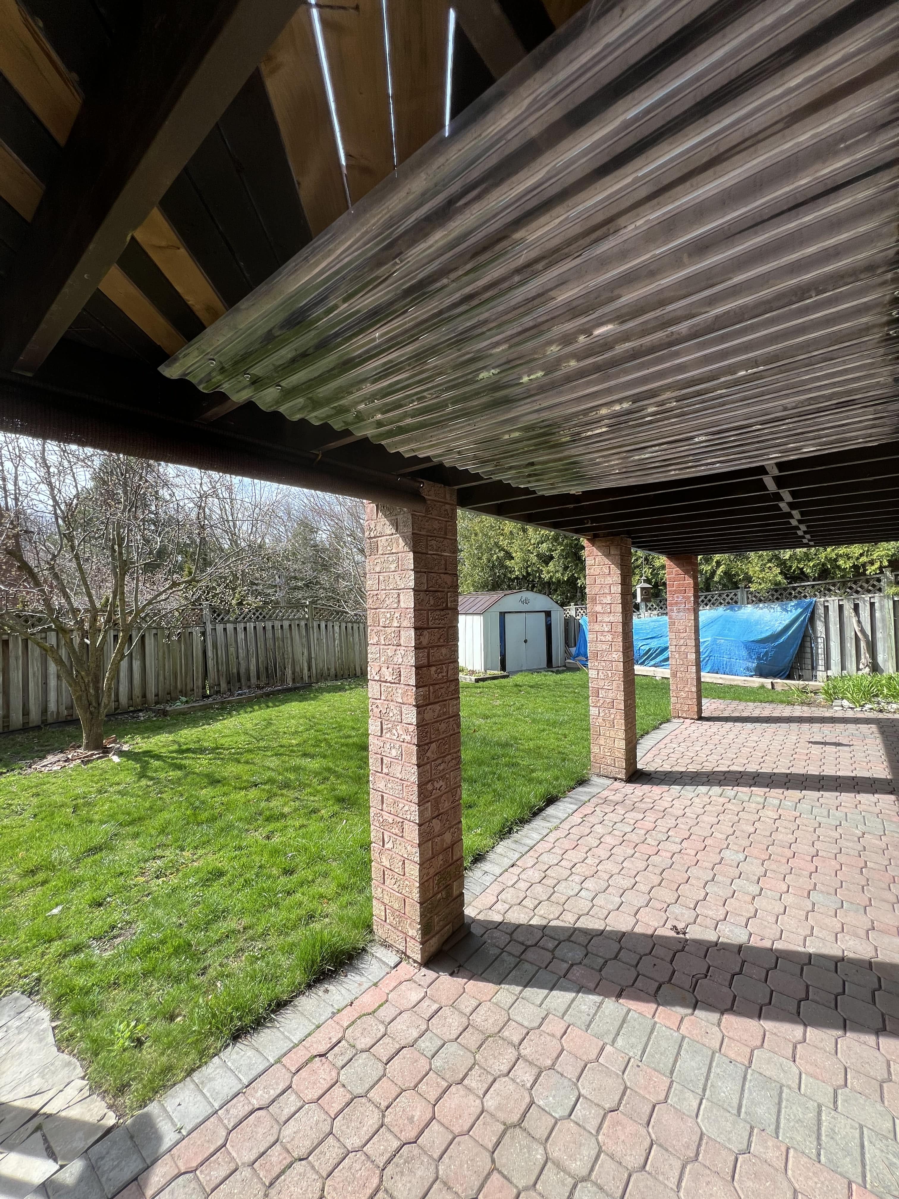 Clean backyard patio after junk removal